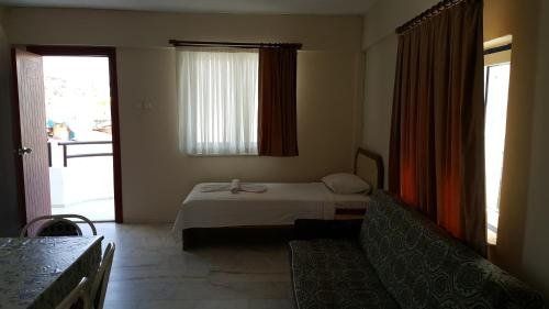 OZGUN APART OTEL KUSADASI фото 4