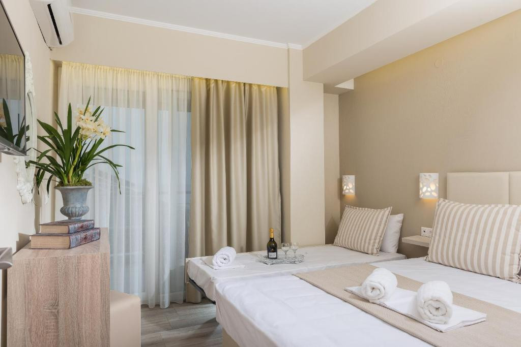 AMMOS BEACH SEASIDE LUXURY SUITES фото 3