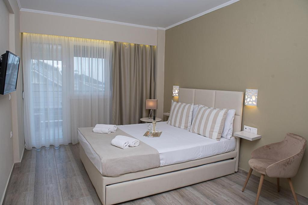 AMMOS BEACH SEASIDE LUXURY SUITES фото 8