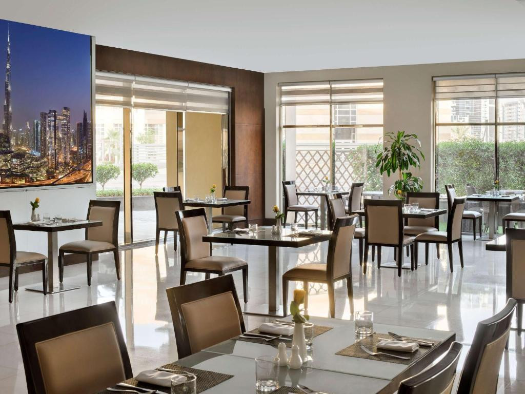 MOVENPICK HOTEL APARTMENTS AL MAMZAR фото 4
